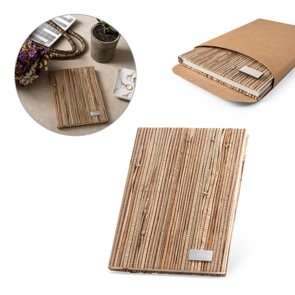 Caderno A5 de capa dura em palha natural com páginas pautadas recicladas